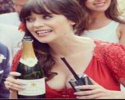 Zooey Deschanel consuming alcohol